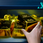Gold Slips 0.3% From Record High as Tariff Relief Boosts Risk Appetite